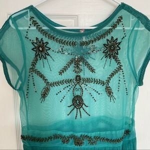 Free People beaded sheer aqua green top. Medium